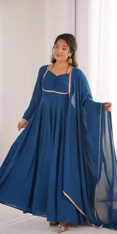 KB 291 Teal Color Fox Blooming Georgette Gown with Lace Work. Affordable Price ₹1899. Delivery 4-6 Working Days. Shop now. | Bollywood Gowns, Creative Gowns, Designer Gowns, Embroidered Gowns, Gowns, Party Wear Gowns