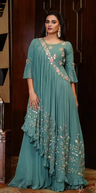 KT 190 Teal in Georgette. Mirror Work & Lace Work Gown Wedding, Party, Festive, Events, Now at just ₹1949. Delivery 4-6 Working Days. Shop now. | Bollywood Gowns, Creative Gowns, Designer Gowns, Embroidered Gowns, Gowns, Party Wear Gowns
