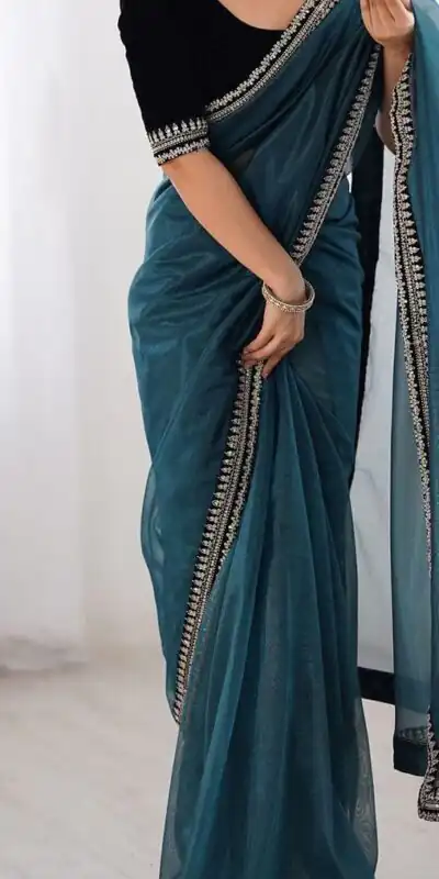 SC 1017 Teal Soft Twil Net Silk Saree Perfect for Wedding, Party, Temple Visit, Reception, Sangeet – . Now at just ₹1699. Delivery 4-6 Working Days. | Bollywood Sarees, Creative Sarees, Designer Sarees, Embroidered Sarees, Ethnic Saree, Modern Digital sarees, Party Wear Sarees, Sarees