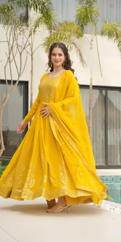 KA 1162 Yellow Faux Blooming Gown with Embroidery Work & Zari Work. Available at ₹2649 only. Delivery 4-6 Working Days. Shop now. | Bollywood Gowns, Creative Gowns, Designer Gowns, Embroidered Gowns, Gowns, Party Wear Gowns