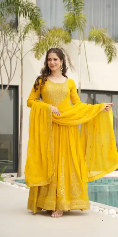 KA 1162 Yellow Faux Blooming Gown with Embroidery Work & Zari Work. Available at ₹2649 only. Delivery 4-6 Working Days. Shop now. | Bollywood Gowns, Creative Gowns, Designer Gowns, Embroidered Gowns, Gowns, Party Wear Gowns