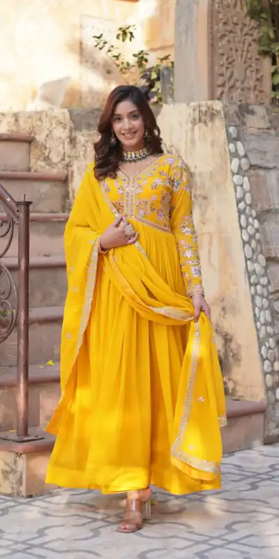 KA 1147 Yellow Faux Blooming Gown with Embroidery Work & Zari Work. Affordable Price ₹2049. Delivery 4-6 Working Days. Shop now. | Bollywood Gowns, Creative Gowns, Designer Gowns, Embroidered Gowns, Gowns, Party Wear Gowns