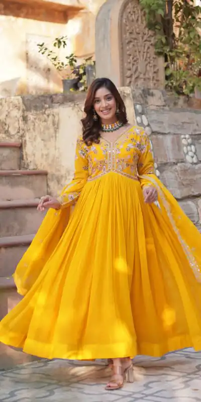 KA 1147 Yellow Faux Blooming Gown with Embroidery Work & Zari Work. Affordable Price ₹2049. Delivery 4-6 Working Days. Shop now. | Bollywood Gowns, Creative Gowns, Designer Gowns, Embroidered Gowns, Gowns, Party Wear Gowns