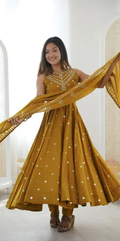 JF 038 Mustered Roman Silk Gown with Embroidery Work. Wedding, Party, Festive, Events, Navratri, Exclusive Offer ₹2149. Delivery 4-6 Working Days. Shop now. | Bollywood Gowns, Creative Gowns, Designer Gowns, Embroidered Gowns, Gowns, Party Wear Gowns