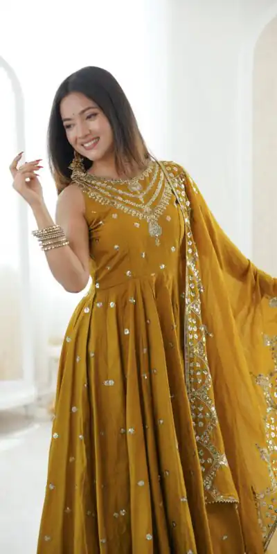 JF 038 Mustered Roman Silk Gown with Embroidery Work. Wedding, Party, Festive, Events, Navratri, Exclusive Offer ₹2149. Delivery 4-6 Working Days. Shop now. | Bollywood Gowns, Creative Gowns, Designer Gowns, Embroidered Gowns, Gowns, Party Wear Gowns