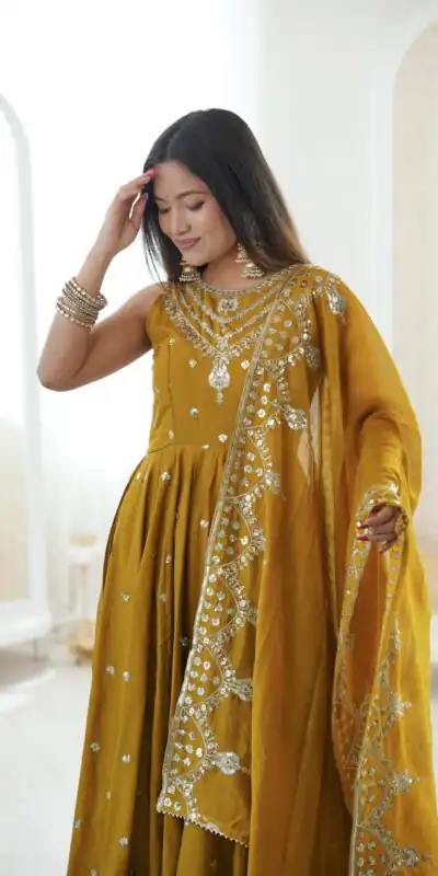 JF 038 Mustered Roman Silk Gown with Embroidery Work. Wedding, Party, Festive, Events, Navratri, Exclusive Offer ₹2149. Delivery 4-6 Working Days. Shop now. | Bollywood Gowns, Creative Gowns, Designer Gowns, Embroidered Gowns, Gowns, Party Wear Gowns