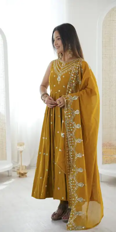 JF 038 Mustered Roman Silk Gown with Embroidery Work. Wedding, Party, Festive, Events, Navratri, Exclusive Offer ₹2149. Delivery 4-6 Working Days. Shop now. | Bollywood Gowns, Creative Gowns, Designer Gowns, Embroidered Gowns, Gowns, Party Wear Gowns