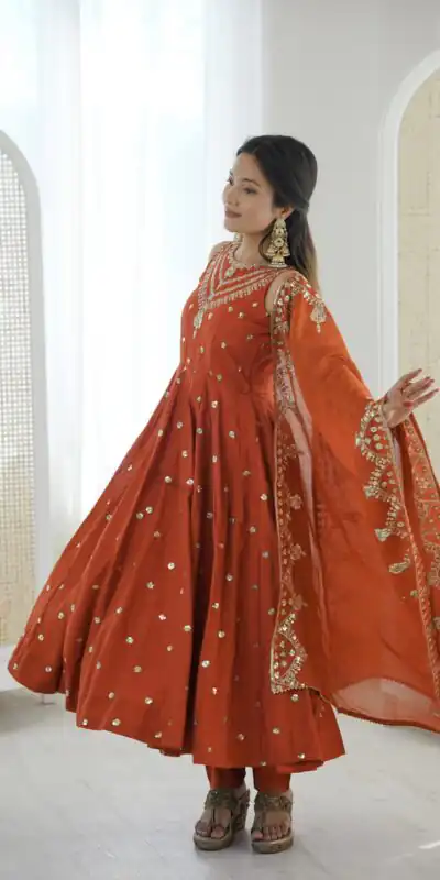 JF 038 Rust Roman Silk Gown with Embroidery Work. Wedding, Party, Festive, Events, Navratri, Exclusive Offer ₹2149. Delivery 4-6 Working Days. Shop now. | Bollywood Gowns, Creative Gowns, Designer Gowns, Embroidered Gowns, Gowns, Party Wear Gowns