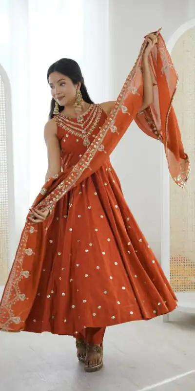 JF 038 Rust Roman Silk Gown with Embroidery Work. Wedding, Party, Festive, Events, Navratri, Exclusive Offer ₹2149. Delivery 4-6 Working Days. Shop now. | Bollywood Gowns, Creative Gowns, Designer Gowns, Embroidered Gowns, Gowns, Party Wear Gowns