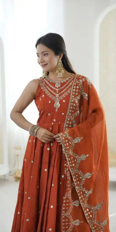 JF 038 Rust Roman Silk Gown with Embroidery Work. Wedding, Party, Festive, Events, Navratri, Exclusive Offer ₹2149. Delivery 4-6 Working Days. Shop now. | Bollywood Gowns, Creative Gowns, Designer Gowns, Embroidered Gowns, Gowns, Party Wear Gowns