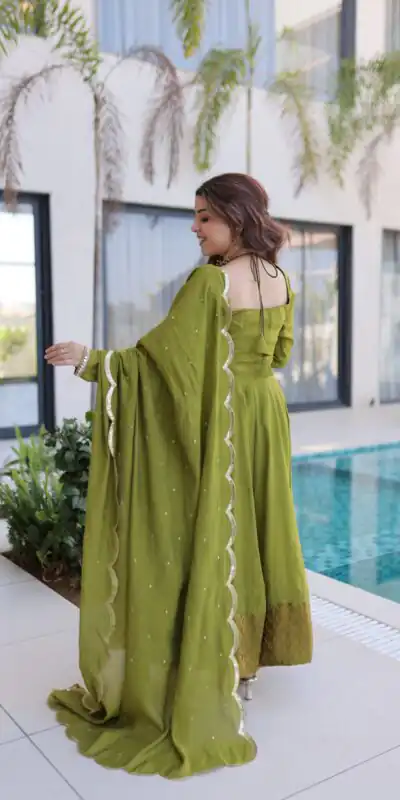 KA 1237 Mehendi Mul Chanderi Anarkali Suit with Embroidery Work & Mirror Work. Grab it for ₹2449. Delivery 4-6 Working Days. Shop now. | Anarkali Suits, Bollywood Anarkali, Creative-Anarkali, Designer Anarkali, Embroidered Anarkali, Party Wear Anarkali