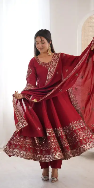 ZF 5016 Maroon Roman Silk Gown with Embroidery Work. Wedding, Party, Festive, Events, Navratri, Exclusive Offer ₹2499. Delivery 4-6 Working Days. Shop now. | Bollywood Gowns, Creative Gowns, Designer Gowns, Embroidered Gowns, Gowns, Party Wear Gowns