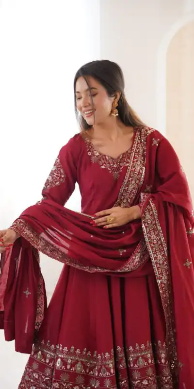 ZF 5016 Maroon Roman Silk Gown with Embroidery Work. Wedding, Party, Festive, Events, Navratri, Exclusive Offer ₹2499. Delivery 4-6 Working Days. Shop now. | Bollywood Gowns, Creative Gowns, Designer Gowns, Embroidered Gowns, Gowns, Party Wear Gowns