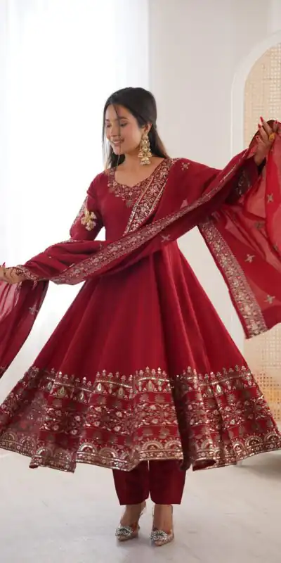 ZF 5016 Maroon Roman Silk Gown with Embroidery Work. Wedding, Party, Festive, Events, Navratri, Exclusive Offer ₹2499. Delivery 4-6 Working Days. Shop now. | Bollywood Gowns, Creative Gowns, Designer Gowns, Embroidered Gowns, Gowns, Party Wear Gowns