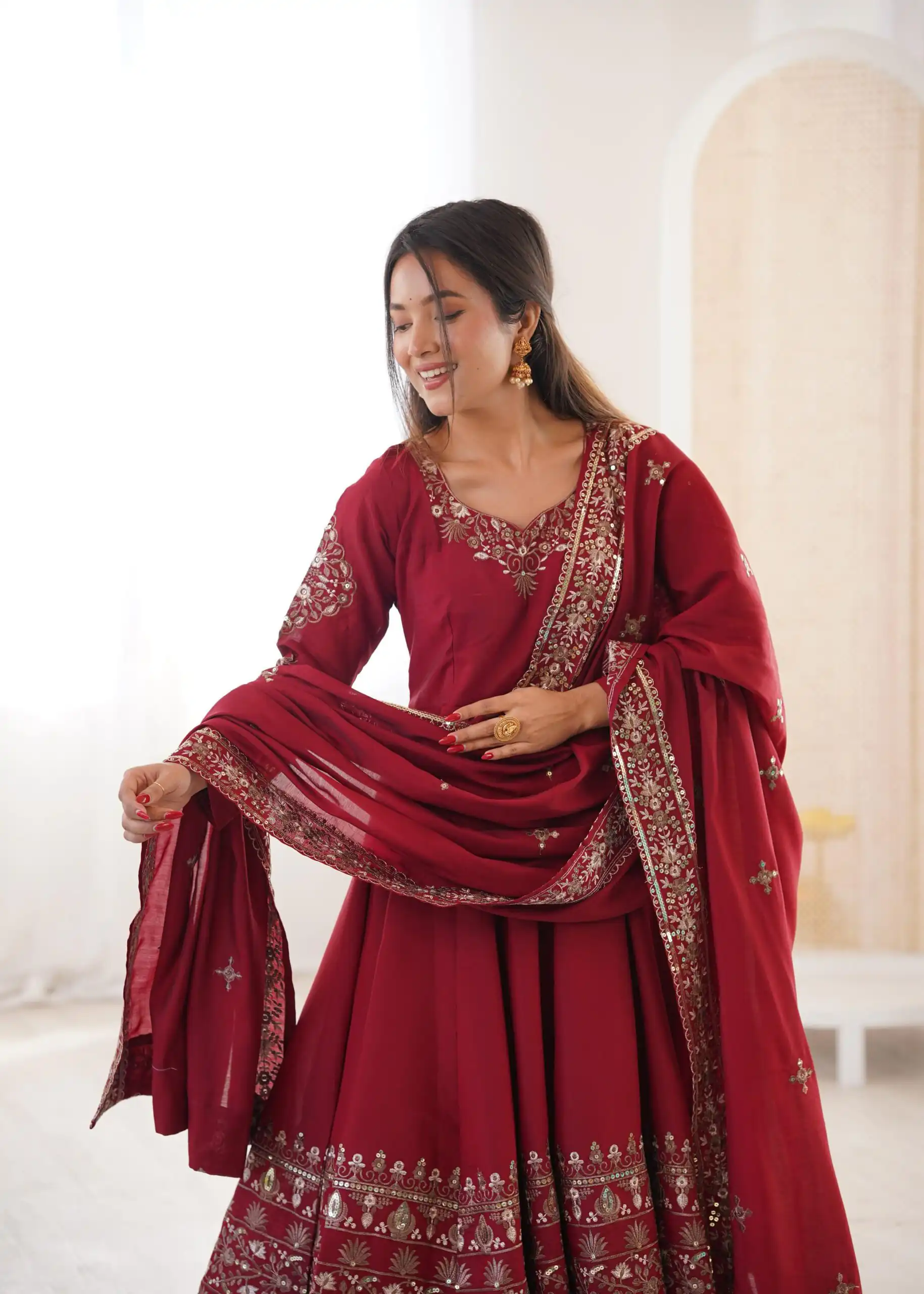ZF 5016 Maroon Roman Silk Gown with Embroidery Work. Wedding, Party, Festive, Events, Navratri, Exclusive Offer ₹2499. Delivery 4-6 Working Days. Shop now. | Bollywood Gowns, Creative Gowns, Designer Gowns, Embroidered Gowns, Gowns, Party Wear Gowns