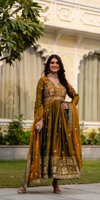 RR 38 Mustered Fendy Satin Gown Perfect for Wedding, Party, Pongal, Makar Sankranti, Ganesh Chaturthi – . Available at ₹2649 only. Delivery 4-6 Wor | Bollywood Gowns, Creative Gowns, Designer Gowns, Embroidered Gowns, Gowns, Party Wear Gowns