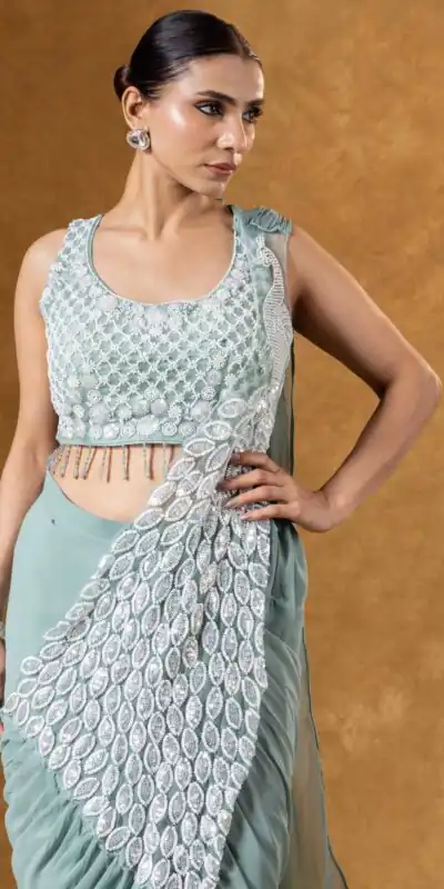 ST 1165 Grey Faux Georgette Saree with Embroidery Work & Sequins Work. Now at just ₹1799. Delivery 4-6 Working Days. Shop now. | Bollywood Sarees, Creative Sarees, Designer Sarees, Embroidered Sarees, Ethnic Saree, Modern Digital sarees, Party Wear Sarees, Sarees