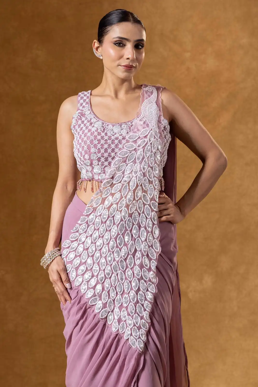 ST 1165 Onion Faux Georgette Saree with Embroidery Work & Sequins Work. Now at just ₹1799. Delivery 4-6 Working Days. Shop now. | Bollywood Sarees, Creative Sarees, Designer Sarees, Embroidered Sarees, Ethnic Saree, Modern Digital sarees, Party Wear Sarees, Sarees