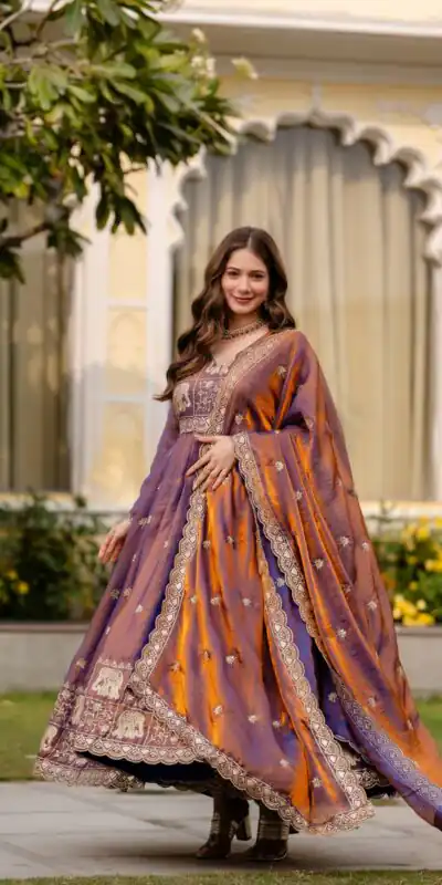 RR 38 Purple Fendy Satin Gown Perfect for Wedding, Party, Pongal, Makar Sankranti, Ganesh Chaturthi – . Available at ₹2649 only. Delivery 4-6 Wor | Bollywood Gowns, Creative Gowns, Designer Gowns, Embroidered Gowns, Gowns, Party Wear Gowns