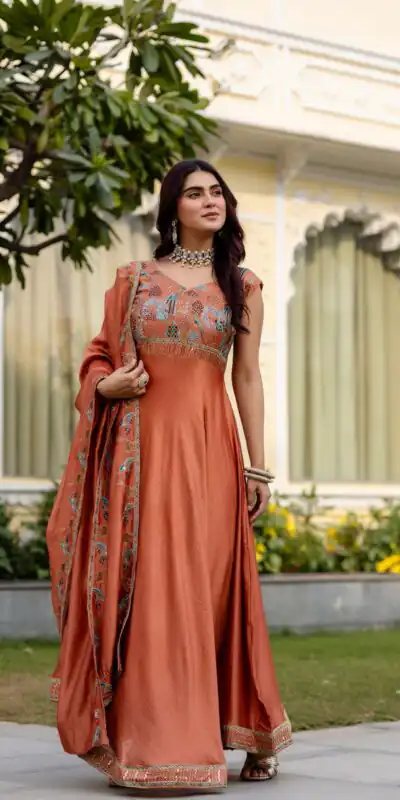 RR 39 Rust Vichitra Silk Gown Perfect for Wedding, Party, Holi, Anniversary, Mehendi –. Grab it for ₹2149. Delivery 4-6 Working Days. Shop now. | Bollywood Gowns, Creative Gowns, Designer Gowns, Embroidered Gowns, Gowns, Party Wear Gowns