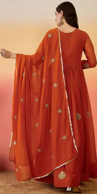 ZF 501 Rust Color Fox Blooming Georgette Gown with Lace Work. Affordable Price ₹2149. Delivery 4-6 Working Days. Shop now. | Bollywood Gowns, Creative Gowns, Designer Gowns, Embroidered Gowns, Gowns, Party Wear Gowns