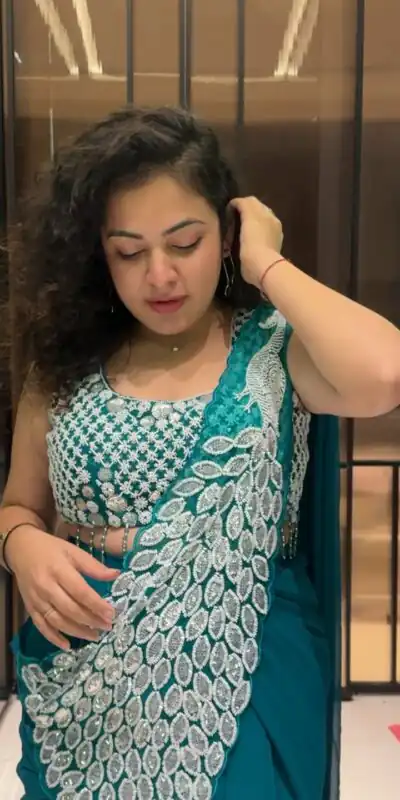 ST 1165 Teal Faux Georgette Saree with Embroidery Work & Sequins Work. Now at just ₹1799. Delivery 4-6 Working Days. Shop now. | Bollywood Sarees, Creative Sarees, Designer Sarees, Embroidered Sarees, Ethnic Saree, Modern Digital sarees, Party Wear Sarees, Sarees