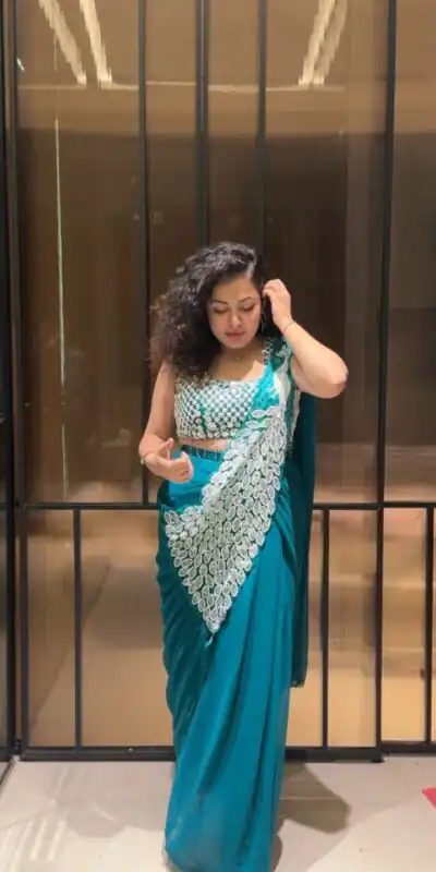 ST 1165 Teal Faux Georgette Saree with Embroidery Work & Sequins Work. Now at just ₹1799. Delivery 4-6 Working Days. Shop now. | Bollywood Sarees, Creative Sarees, Designer Sarees, Embroidered Sarees, Ethnic Saree, Modern Digital sarees, Party Wear Sarees, Sarees