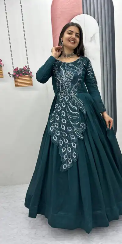 PC 564 Teal Vichitra Silk Gown Perfect for Wedding, Party, Holi, Anniversary, Mehendi –. Grab it for ₹2049. Delivery 4-6 Working Days. Shop now. | Bollywood Gowns, Creative Gowns, Designer Gowns, Embroidered Gowns, Gowns, Party Wear Gowns