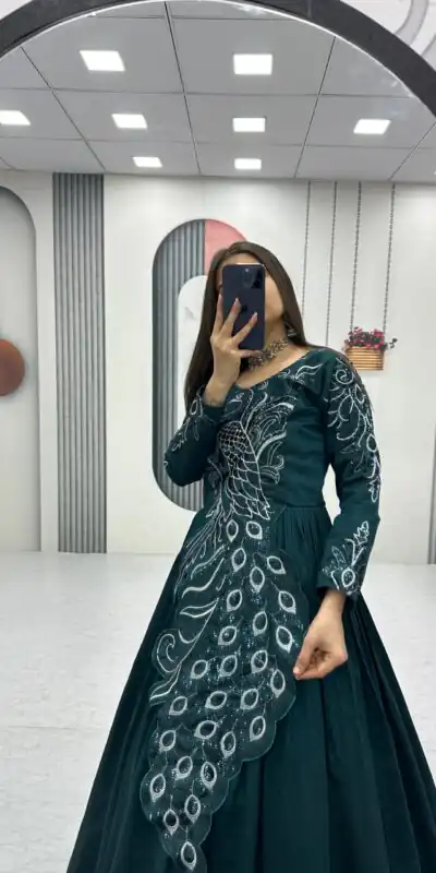 PC 564 Teal Vichitra Silk Gown Perfect for Wedding, Party, Holi, Anniversary, Mehendi –. Grab it for ₹2049. Delivery 4-6 Working Days. Shop now. | Bollywood Gowns, Creative Gowns, Designer Gowns, Embroidered Gowns, Gowns, Party Wear Gowns