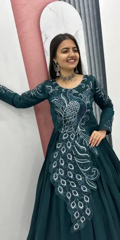PC 564 Teal Vichitra Silk Gown Perfect for Wedding, Party, Holi, Anniversary, Mehendi –. Grab it for ₹2049. Delivery 4-6 Working Days. Shop now. | Bollywood Gowns, Creative Gowns, Designer Gowns, Embroidered Gowns, Gowns, Party Wear Gowns