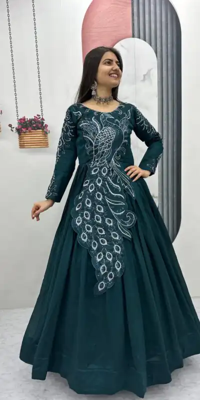 PC 564 Teal Vichitra Silk Gown Perfect for Wedding, Party, Holi, Anniversary, Mehendi –. Grab it for ₹2049. Delivery 4-6 Working Days. Shop now. | Bollywood Gowns, Creative Gowns, Designer Gowns, Embroidered Gowns, Gowns, Party Wear Gowns