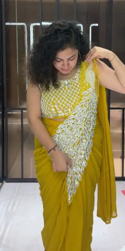 ST 1165 Yellow Faux Georgette Saree with Embroidery Work & Sequins Work. Now at just ₹1799. Delivery 4-6 Working Days. Shop now. | Bollywood Sarees, Creative Sarees, Designer Sarees, Embroidered Sarees, Ethnic Saree, Modern Digital sarees, Party Wear Sarees, Sarees