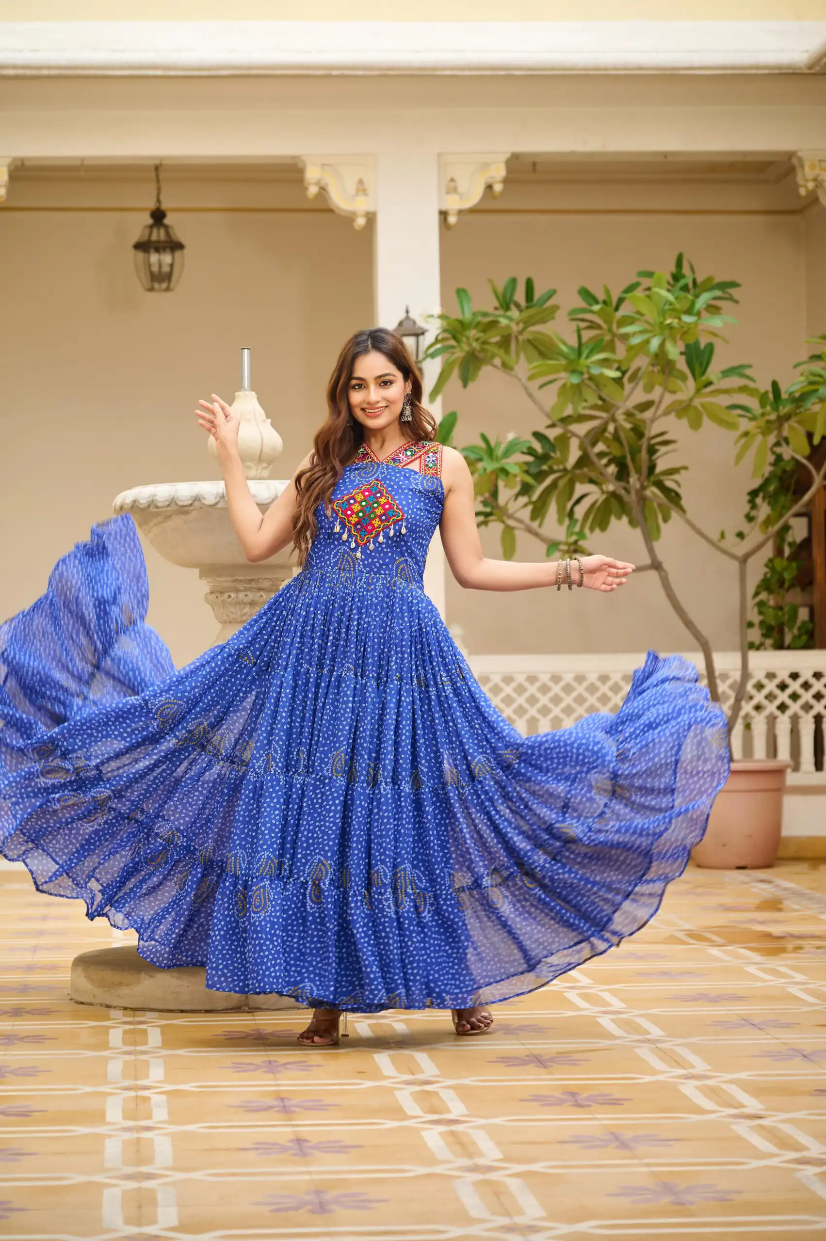 Ram 108 Blue Color Georgette Bandhni Print Gown with Mirror Work. Best Price ₹2049. Delivery 4-6 Working Days. Online Shop now. | Bollywood Gowns, Creative Gowns, Designer Gowns, Embroidered Gowns, Gowns, Party Wear Gowns