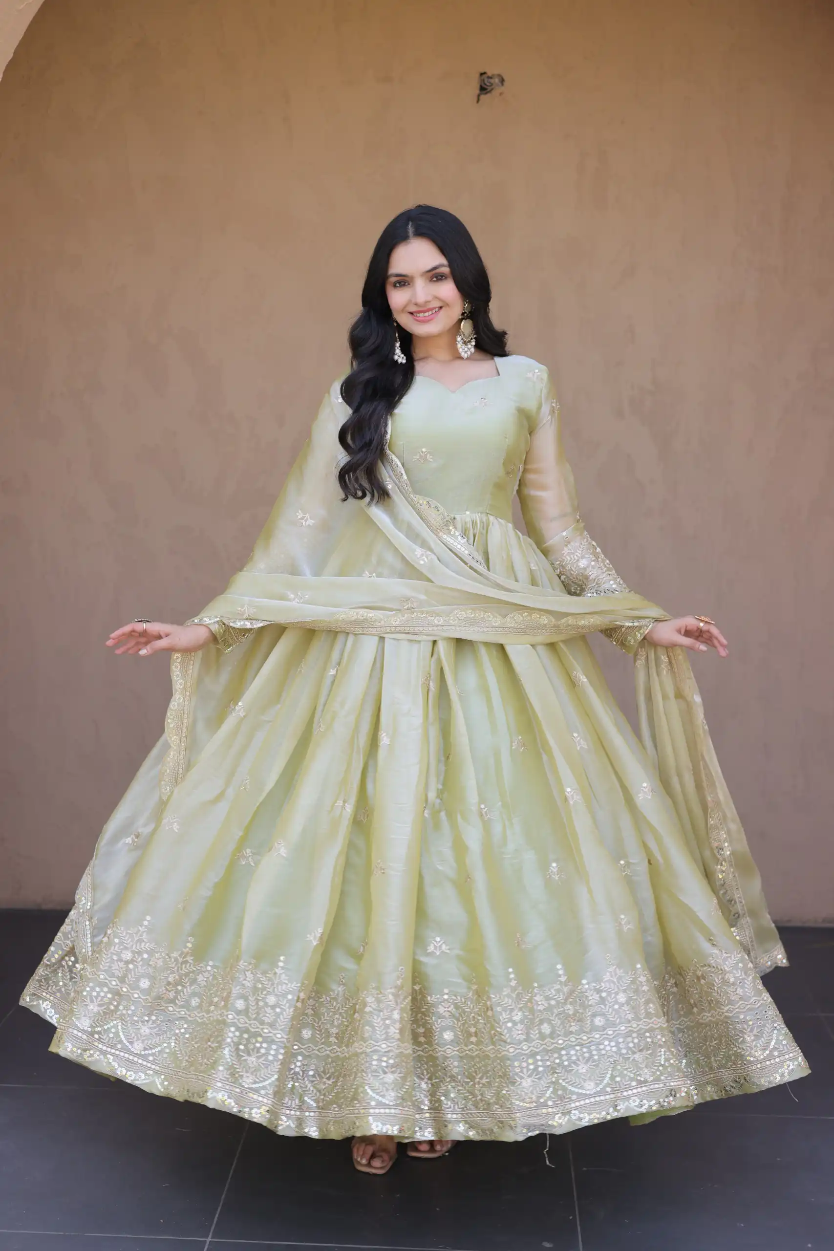 KA 1260 Light Pista Color Fendi Silk Gown with Embroidery Work & Zari Work. Now at just ₹2599. Delivery 4-6 Working Days. Shop now. | Bollywood Gowns, Creative Gowns, Designer Gowns, Embroidered Gowns, Gowns, Party Wear Gowns