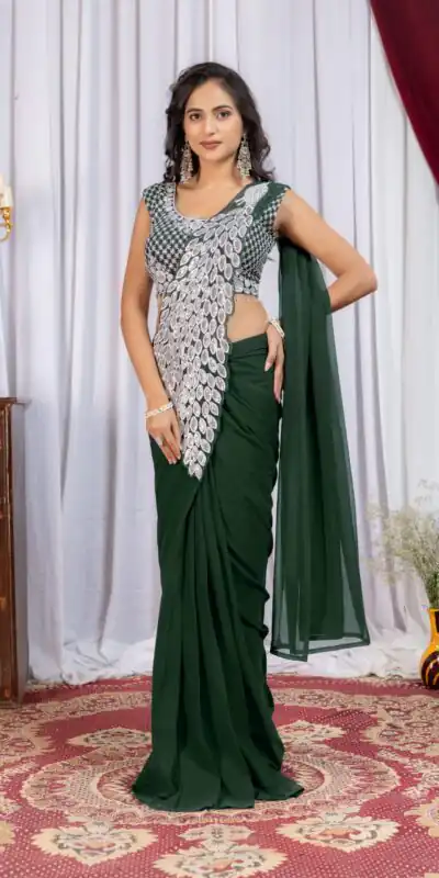 ST 1165 Green Faux Georgette Saree with Embroidery Work & Sequins Work. Now at just ₹1799. Delivery 4-6 Working Days. Shop now. | Bollywood Sarees, Creative Sarees, Designer Sarees, Embroidered Sarees, Ethnic Saree, Modern Digital sarees, Party Wear Sarees, Sarees