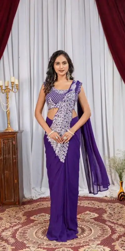 ST 1165 Purple Faux Georgette Saree with Embroidery Work & Sequins Work. Now at just ₹1799. Delivery 4-6 Working Days. Shop now. | Bollywood Sarees, Creative Sarees, Designer Sarees, Embroidered Sarees, Ethnic Saree, Modern Digital sarees, Party Wear Sarees, Sarees