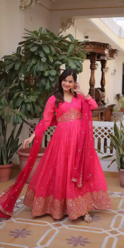 KA 1235 Pink Color Russian Silk Gown with Zari Work & Embroidery Work. Now at just ₹2499. Delivery 4-6 Working Days. Shop now. | Bollywood Gowns, Creative Gowns, Designer Gowns, Embroidered Gowns, Gowns, Party Wear Gowns