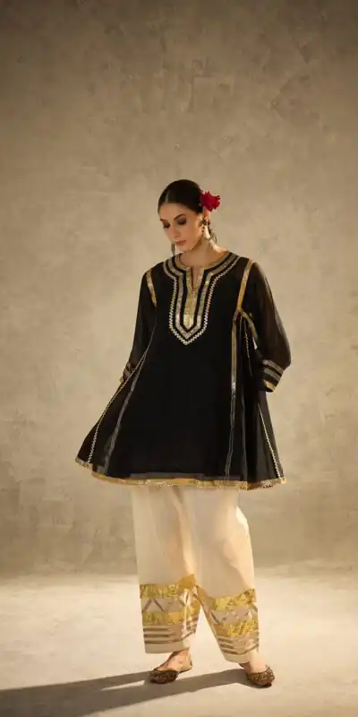 ST 1169 Black Black Chinon Salwar Suit with Gotta Patti Work. Available at ₹1849 only. Delivery 4-6 Working Days. Shop now. | Jump Suits, Straight Suits, Casual Suits, Creative suits, Designer Suits, Palazzo Suits, Party Wear Suits, Patiala Suits, Salwar suit