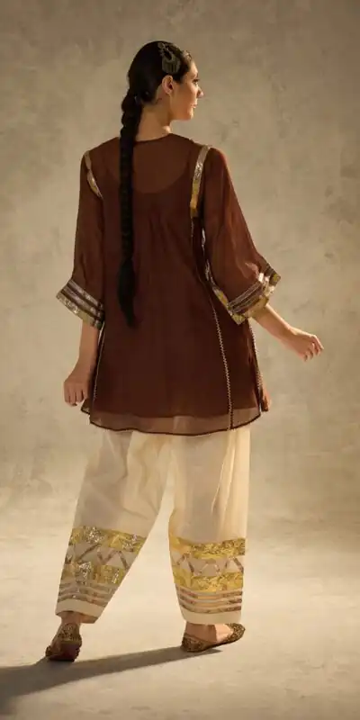 ST 1169 Rust Color Chinon Salwar Suit with Gotta Patti Work. Available at ₹1849 only. Delivery 4-6 Working Days. Shop now. | Jump Suits, Straight Suits, Casual Suits, Creative suits, Designer Suits, Palazzo Suits, Party Wear Suits, Patiala Suits, Salwar suit