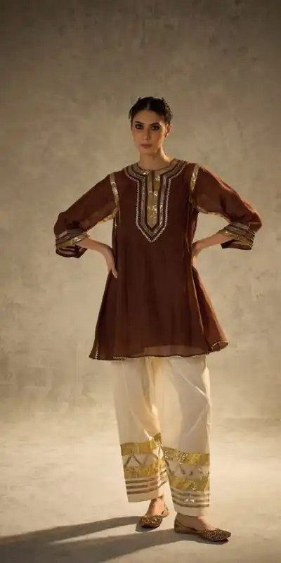 ST 1169 Rust Color Chinon Salwar Suit with Gotta Patti Work. Available at ₹1849 only. Delivery 4-6 Working Days. Shop now. | Jump Suits, Straight Suits, Casual Suits, Creative suits, Designer Suits, Palazzo Suits, Party Wear Suits, Patiala Suits, Salwar suit