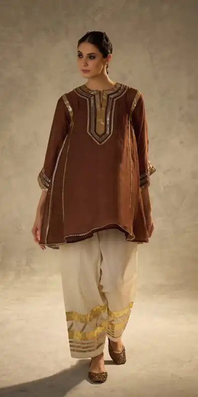 ST 1169 Rust Color Chinon Salwar Suit with Gotta Patti Work. Available at ₹1849 only. Delivery 4-6 Working Days. Shop now. | Jump Suits, Straight Suits, Casual Suits, Creative suits, Designer Suits, Palazzo Suits, Party Wear Suits, Patiala Suits, Salwar suit
