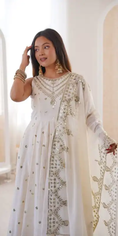JF 038 White Roman Silk Gown with Embroidery Work. Wedding, Party, Festive, Events, Navratri, Exclusive Offer ₹2149. Delivery 4-6 Working Days. Shop now. | Bollywood Gowns, Creative Gowns, Designer Gowns, Embroidered Gowns, Gowns, Party Wear Gowns