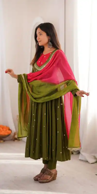 ZF 5023 Mehandi Roman Silk Gown with Mirror Work & Embroidery Work. Special Price ₹2099. Delivery 4-6 Working Days. Shop now. | Bollywood Gowns, Creative Gowns, Designer Gowns, Embroidered Gowns, Gowns, Party Wear Gowns