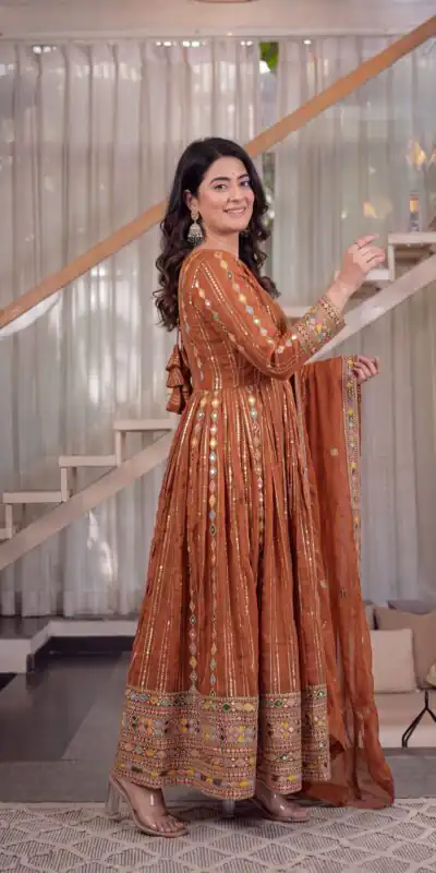 MD 3100 Orange Faux Blooming Gown Perfect for Wedding, Party, Pongal, Raksha Bandhan, Mehendi –. Introductory Price ₹2549. Delivery 4-6 Working Days | Bollywood Gowns, Creative Gowns, Designer Gowns, Embroidered Gowns, Gowns, Party Wear Gowns