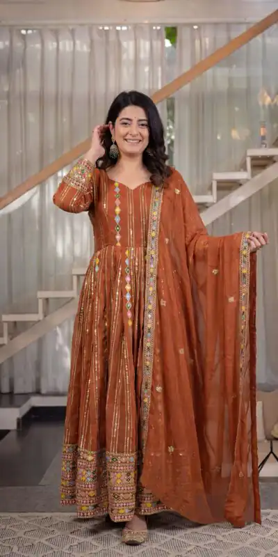 MD 3100 Orange Faux Blooming Gown Perfect for Wedding, Party, Pongal, Raksha Bandhan, Mehendi –. Introductory Price ₹2549. Delivery 4-6 Working Days | Bollywood Gowns, Creative Gowns, Designer Gowns, Embroidered Gowns, Gowns, Party Wear Gowns