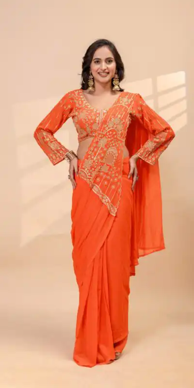 ST 1172 Orange Faux Georgette Saree with Embroidery Work & Bead Work. Now at just ₹1849. Delivery 4-6 Working Days. Shop now. | Bollywood Sarees, Creative Sarees, Designer Sarees, Embroidered Sarees, Ethnic Saree, Modern Digital sarees, Party Wear Sarees, Sarees