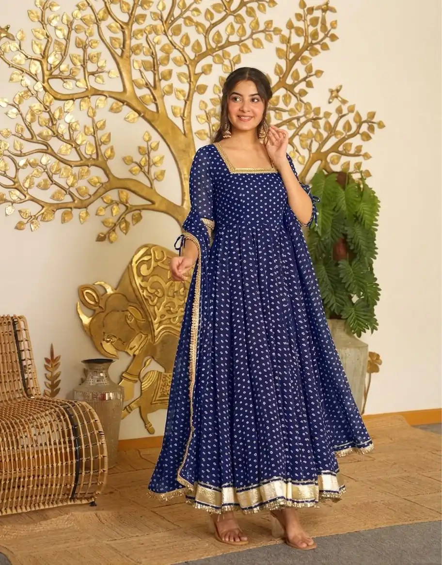AD 239 Navy Blue in Colour Faux Georgette Bandhani Print Work Gown. Available at ₹1999 only. Delivery 4-6 Working Days. Shop now. | Bollywood Gowns, Creative Gowns, Designer Gowns, Embroidered Gowns, Gowns, Party Wear Gowns