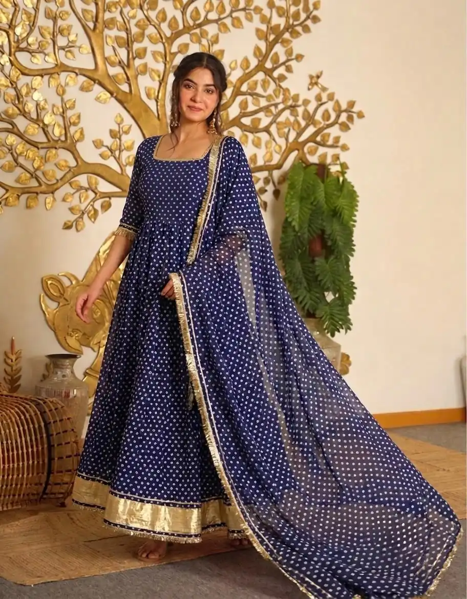 AD 239 Navy Blue in Colour Faux Georgette Bandhani Print Work Gown. Available at ₹1999 only. Delivery 4-6 Working Days. Shop now. | Bollywood Gowns, Creative Gowns, Designer Gowns, Embroidered Gowns, Gowns, Party Wear Gowns