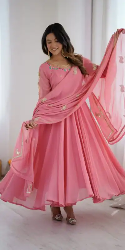 SRK 5363 Dusty Pink | Dusty Pink Faux Georgette Gown with Sequins Work & Embroidery Work. Affordable Price ₹2099. Delivery 4-6 Working Days. Shop now. | Bollywood Gowns, Creative Gowns, Designer Gowns, Embroidered Gowns, Gowns, Party Wear Gowns