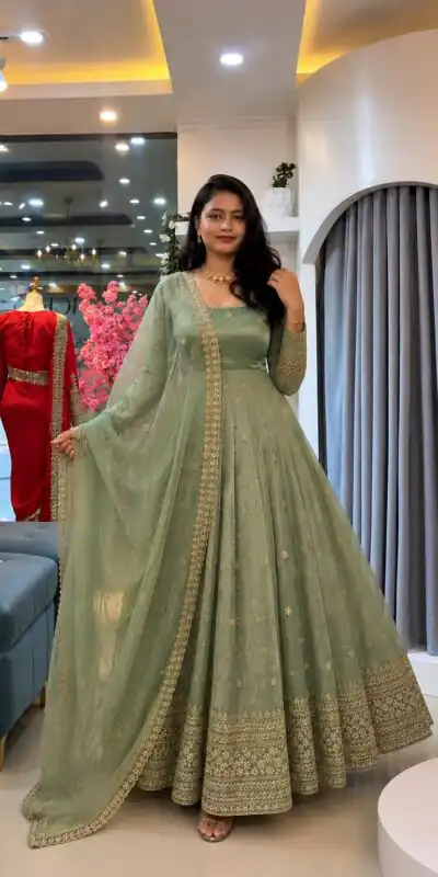 SSR 547 Pista in Crunchy Silk Embroidery Work & Lace Work Gown . Special Price ₹2399. Delivery 4-6 Working Days. Shop now. | Bollywood Gowns, Creative Gowns, Designer Gowns, Embroidered Gowns, Gowns, Party Wear Gowns